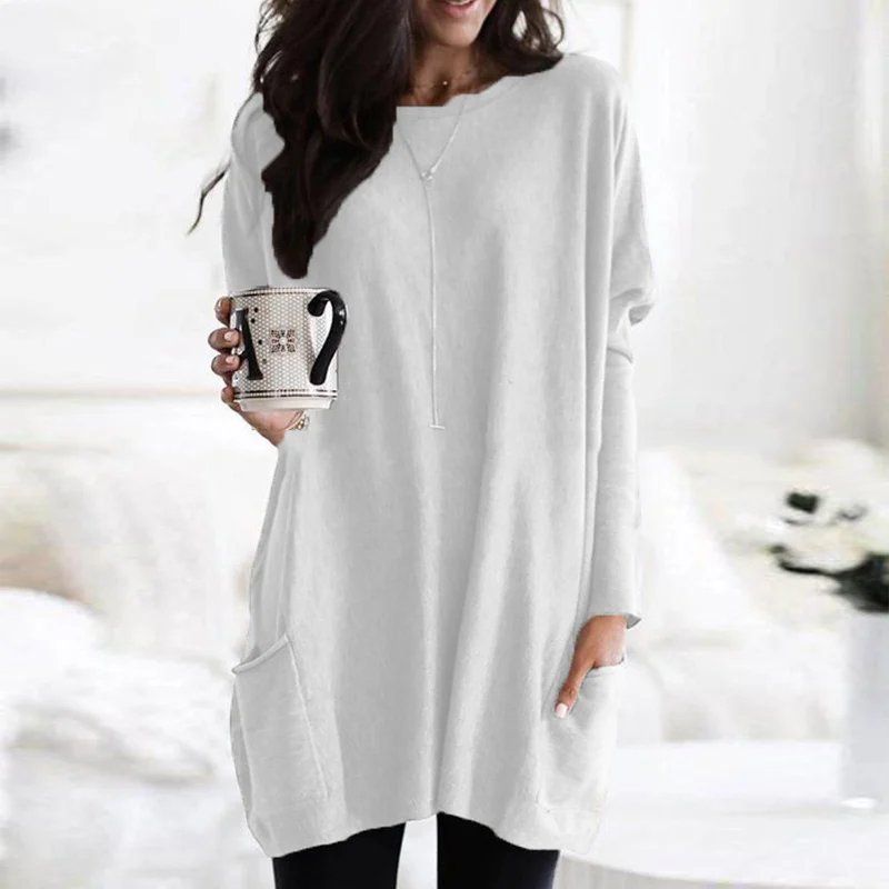 Comfort-focused women's long sleeve tunic, oversized silhouette with deep pockets for essentials.
