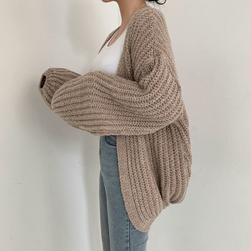 Women's oversized open-front knit cardigan sweater in a cozy, comfortable style, perfect for fall.