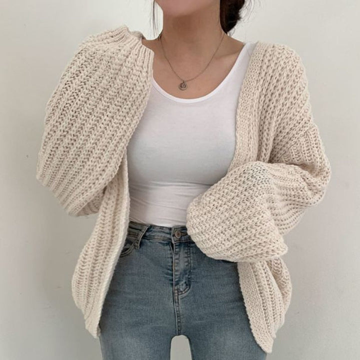 Soft knit women's oversized open-front sweater, a fashionable and comfortable cardigan for daily wear.