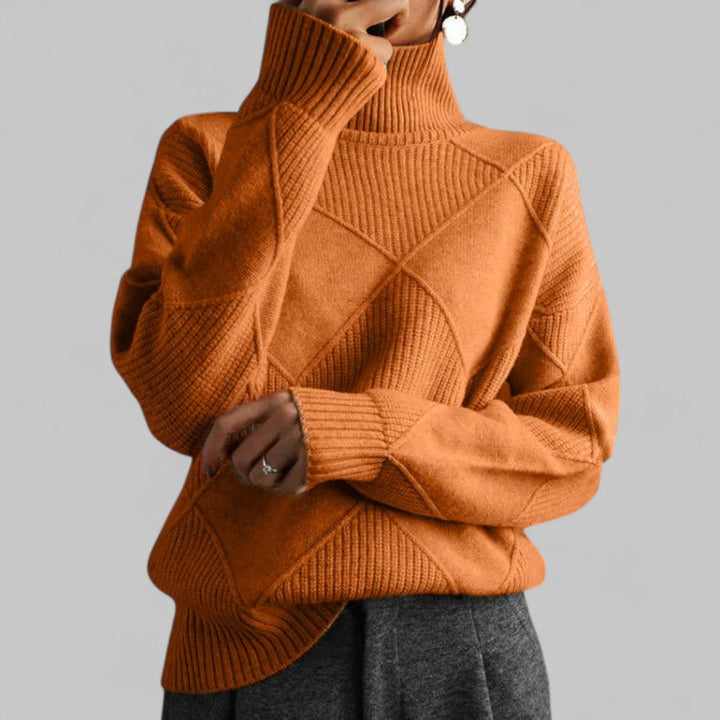 Trendy women's oversized turtleneck sweater showcasing an attractive pattern, great for layering.