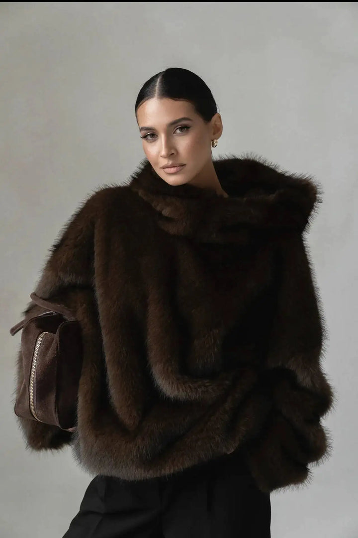 Luxuriously soft women's oversized plush hoodie, a warm winter pullover for ultimate cozy comfort & casual style.