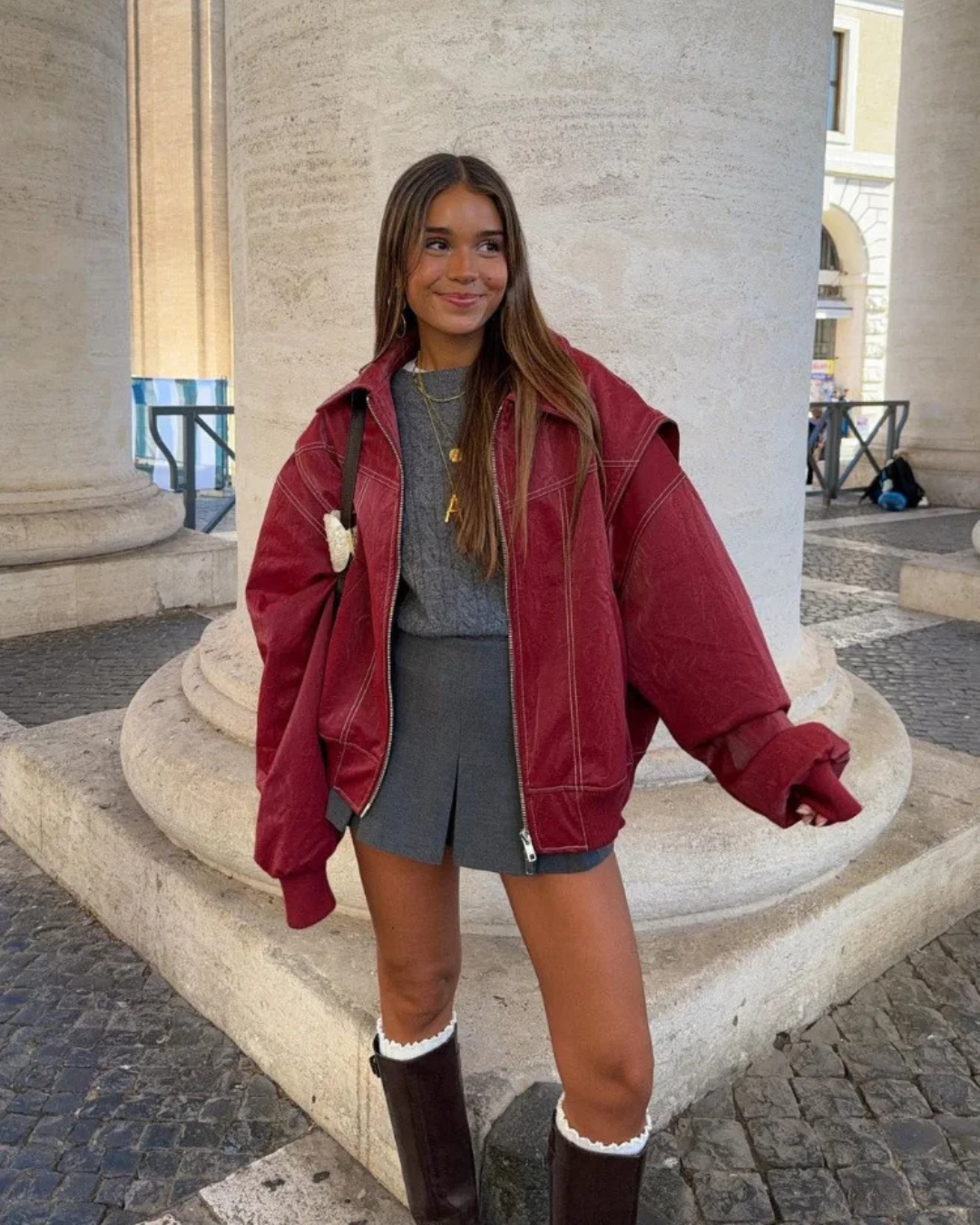 Women's oversized red faux leather bomber jacket, zip-up, casual outerwear for a trendy look