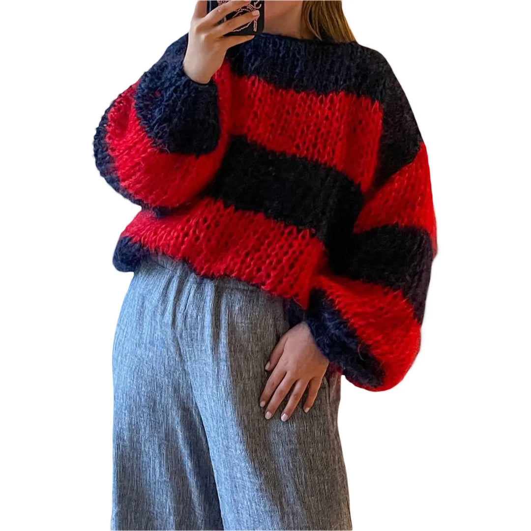 Comfortable women's striped knit jumper. Oversized fit for winter fashion. Long sleeve casual wear.