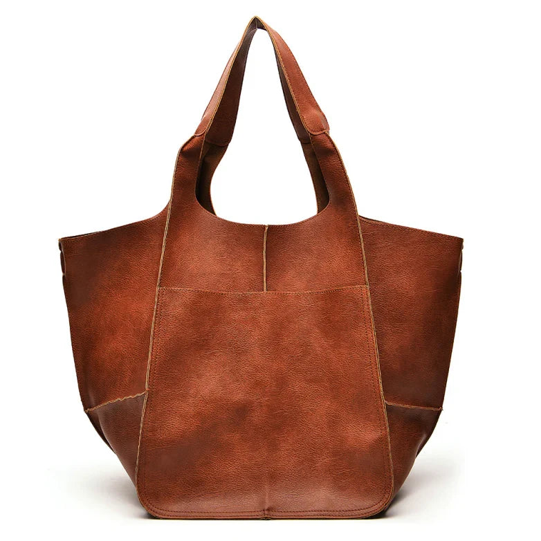 Effortless style with this women's oversized vintage leather shoulder bag.
