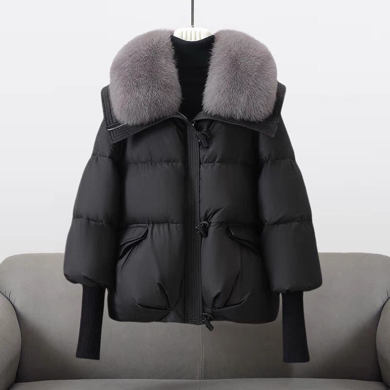 Women's padded winter jacket with fur collar, perfect for cold weather, front view.