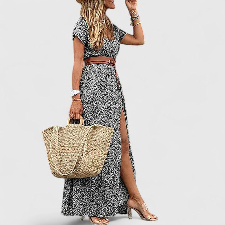 Stylish women's short sleeve paisley maxi dress, V-neck design, belted for a flattering fit, with a trendy side slit.