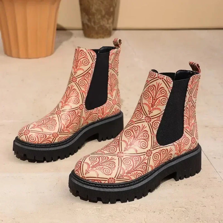 Side view of women's comfortable patchwork ankle boots, showing the sturdy lug sole design.