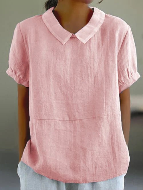 Elegant women's Peter Pan collar blouse, relaxed fit, offering vintage charm and versatile summer wear.