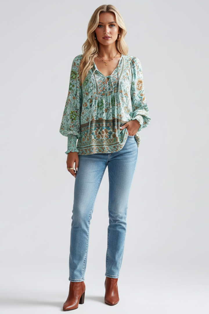 Effortless women's loose fit floral blouse, a versatile long sleeve V-neck top for comfortable spring & summer fashion.