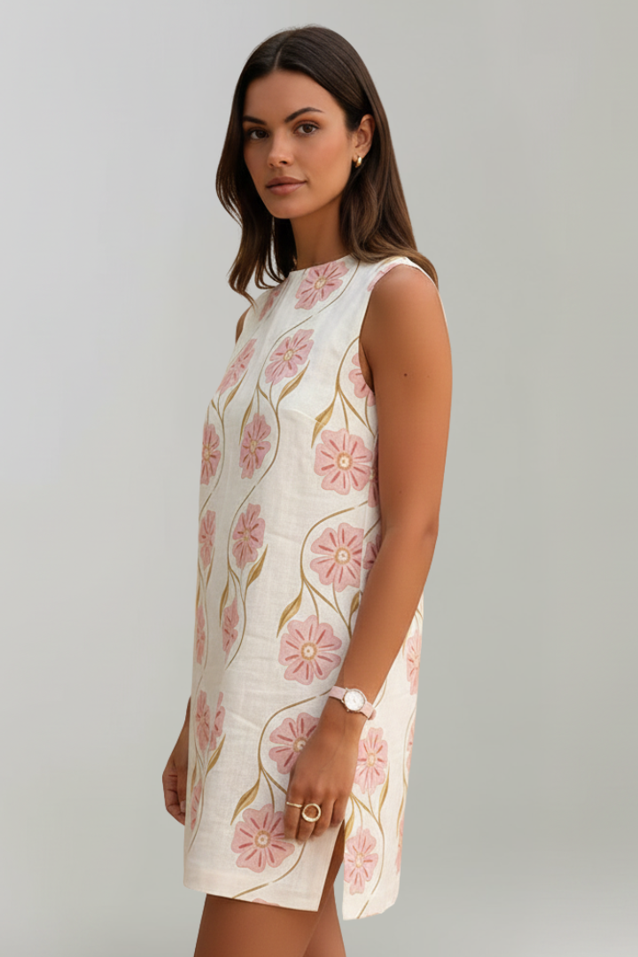 Comfortable women's A-line floral print mini dress. Sleeveless, ideal for summer fashion & feminine style.
