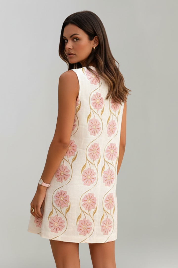 Feminine women's floral print mini dress. Sleeveless A-line design, comfortable for summer fashion & vacation.