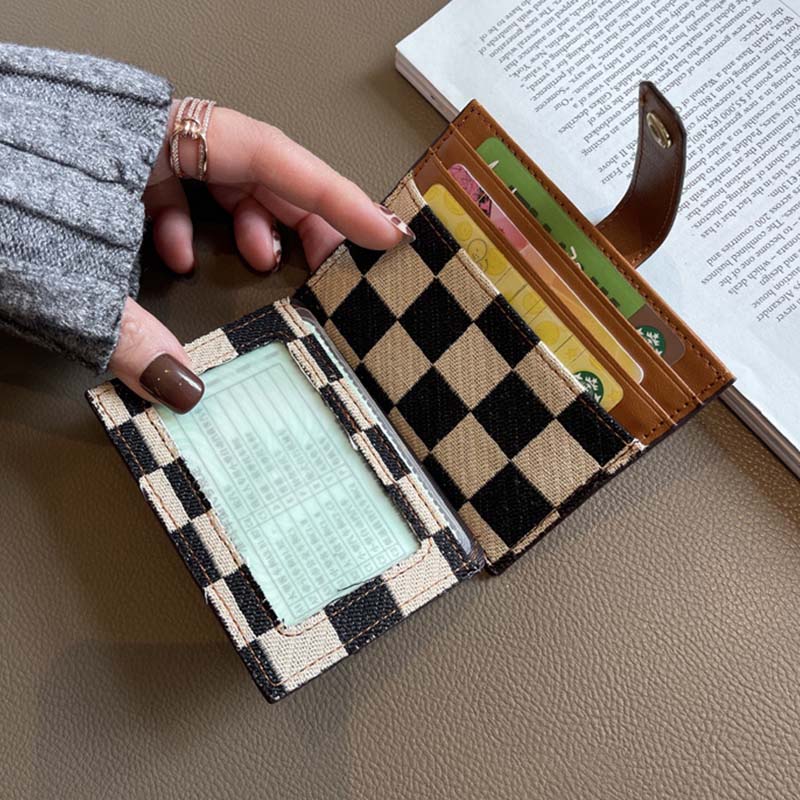 A collection of women's plaid colorblock compact wallets in various color combinations