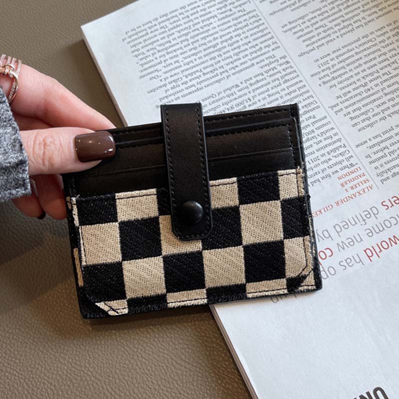 Back view of women's PU leather compact wallet, showcasing the colorblock design element