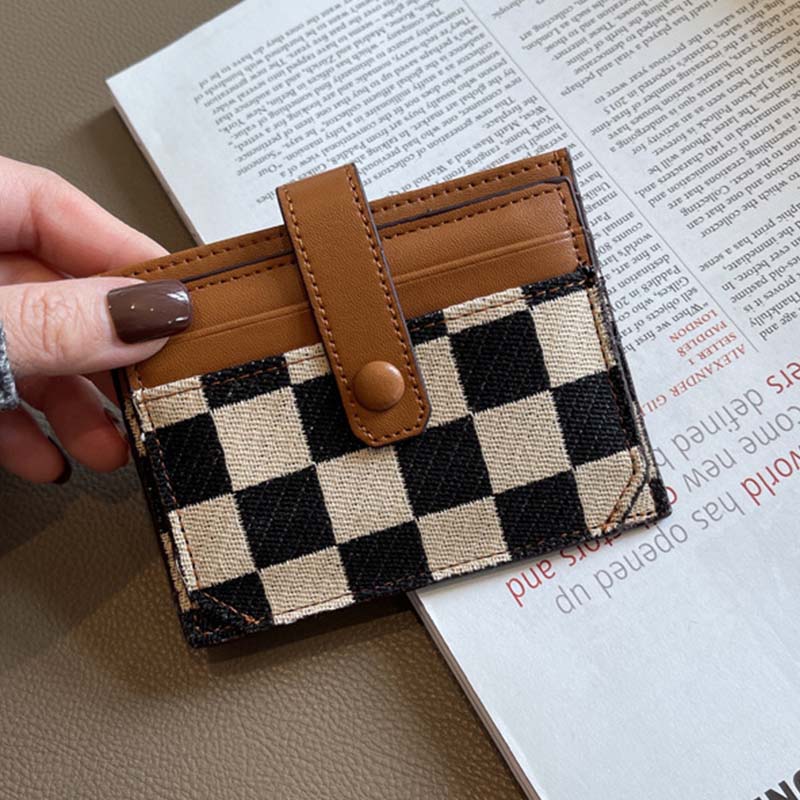 Women's plaid colorblock compact wallet, held in hand to show scale, a practical card holder