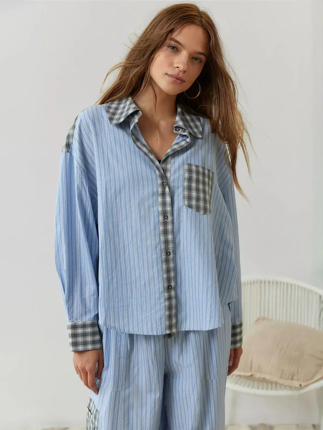 Classic plaid women's pajama set, includes a button-up long-sleeve top & relaxed pants for ultimate comfort.