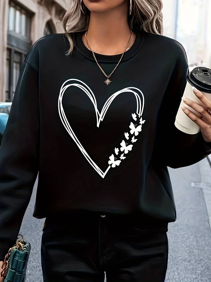 Cute women's heart print pullover sweater with a round neck. Perfect comfortable long-sleeve fashion top for casual wear.