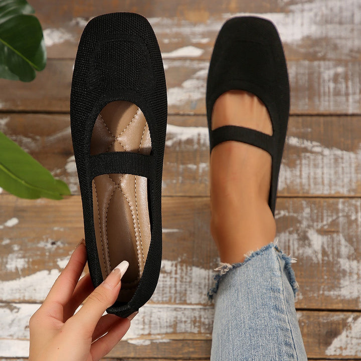 Casual women's ballet flats, Mary Jane style with a fun smiling face and comfortable design for daily wear.