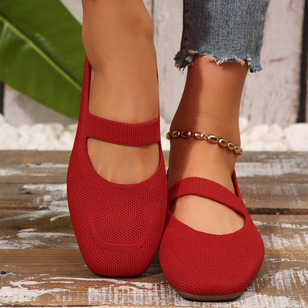 Playful women's Mary Jane ballet flats with smiling face detail, ideal comfortable shoes for everyday casual wear.