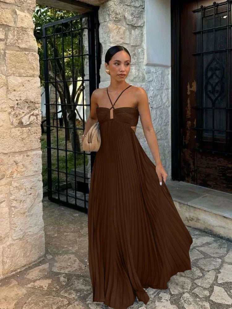 Women's pleated halter cutout maxi dress, perfect for wedding guests.