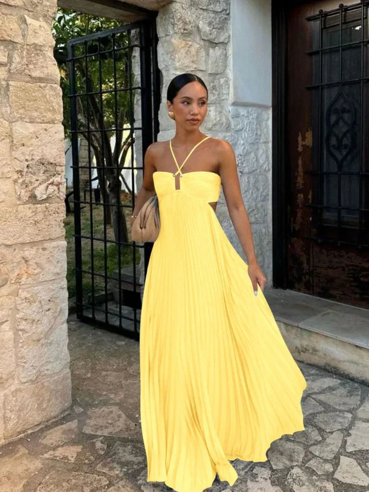 Elegant women's maxi dress with halter & cutout, ideal for wedding guests & formal events.
