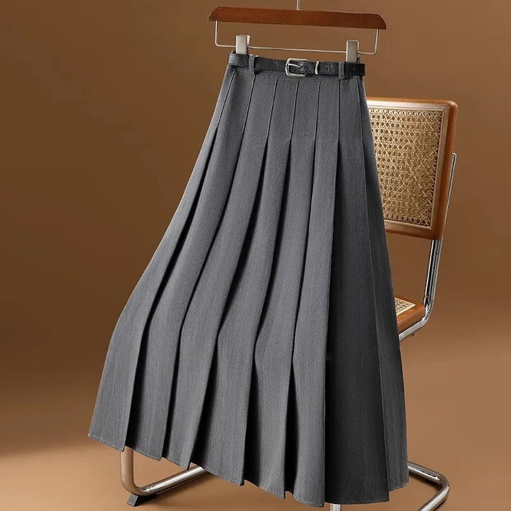 Flowy women's pleated midi skirt with a tie belt, a versatile addition to any casual outfit