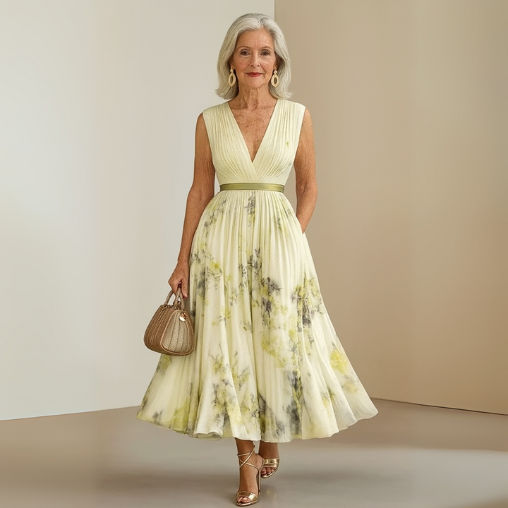 Chic women's pleated sleeveless V-neck maxi summer dress, ideal for vacation or casual events.