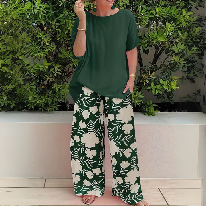 Women's plus size elegant floral two-piece set with wide-leg pants, perfect for spring & summer casual wear.