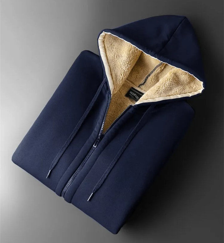 Oversized fit plus-size winter jacket for women. Hooded design offers cozy warmth and ultimate cold protection.
