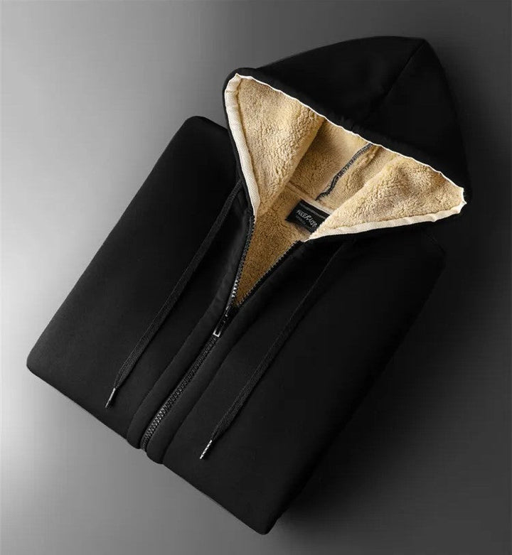 Fashionable plus-size women's winter coat. Cozy hooded design, warm fleece, ultimate cold weather protection.