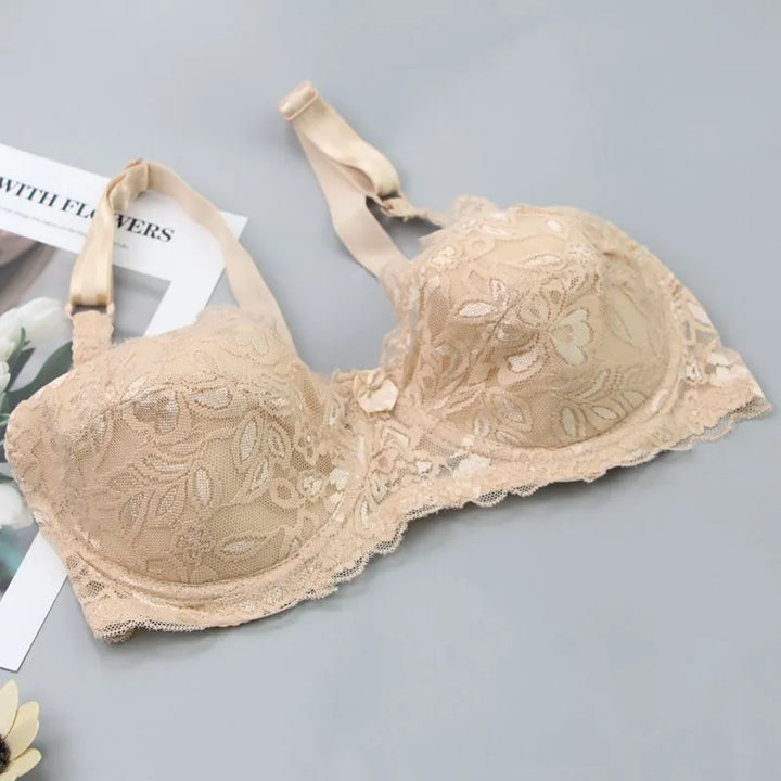Plus size lace push-up bra for women. Underwire support, adjustable straps, comfortable intimate apparel.