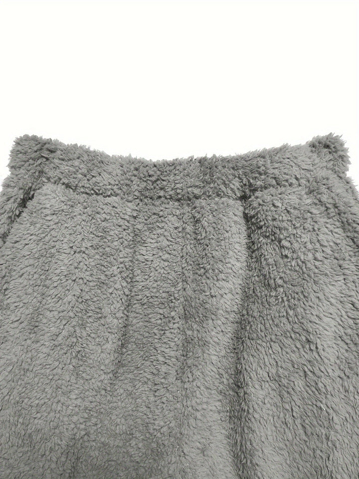 Warm women's coral fleece loungewear set, perfect two-piece pajamas for cozy autumn & winter evenings.