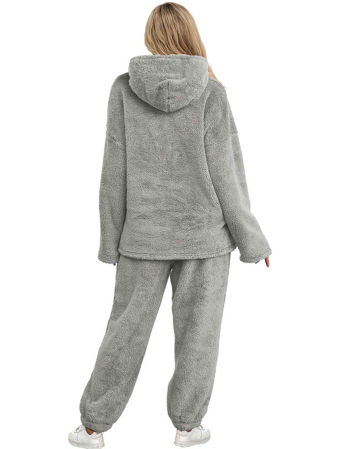 Women's warm coral fleece loungewear set. Cozy two-piece plush homewear for ultimate comfort.