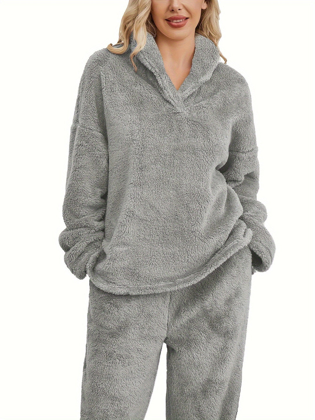 Winter essential: Women's plush coral fleece loungewear set, a warm & cozy pajama outfit for relaxing.
