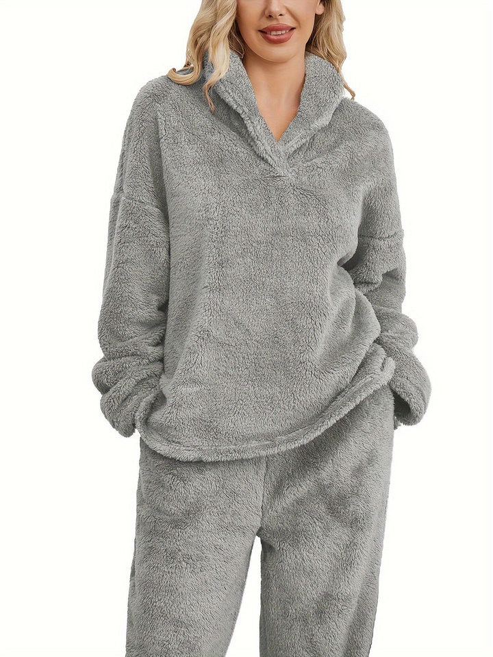 Winter essential: Women's plush coral fleece loungewear set, a warm & cozy pajama outfit for relaxing.