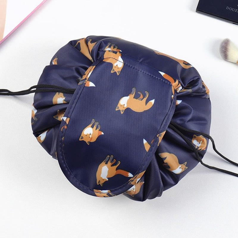 Close-up of secure drawstring closure on women's travel cosmetic & toiletry bag for peace of mind.