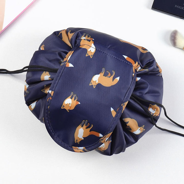 Close-up of secure drawstring closure on women's travel cosmetic & toiletry bag for peace of mind.