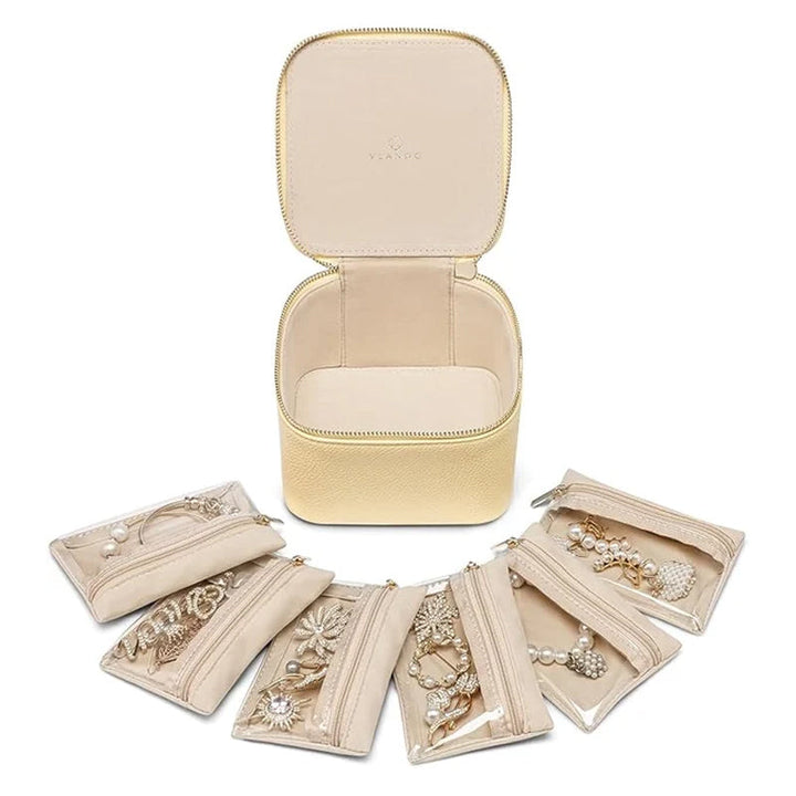 Small yet spacious leather jewelry travel case in pink, ideal for rings, earrings, necklaces