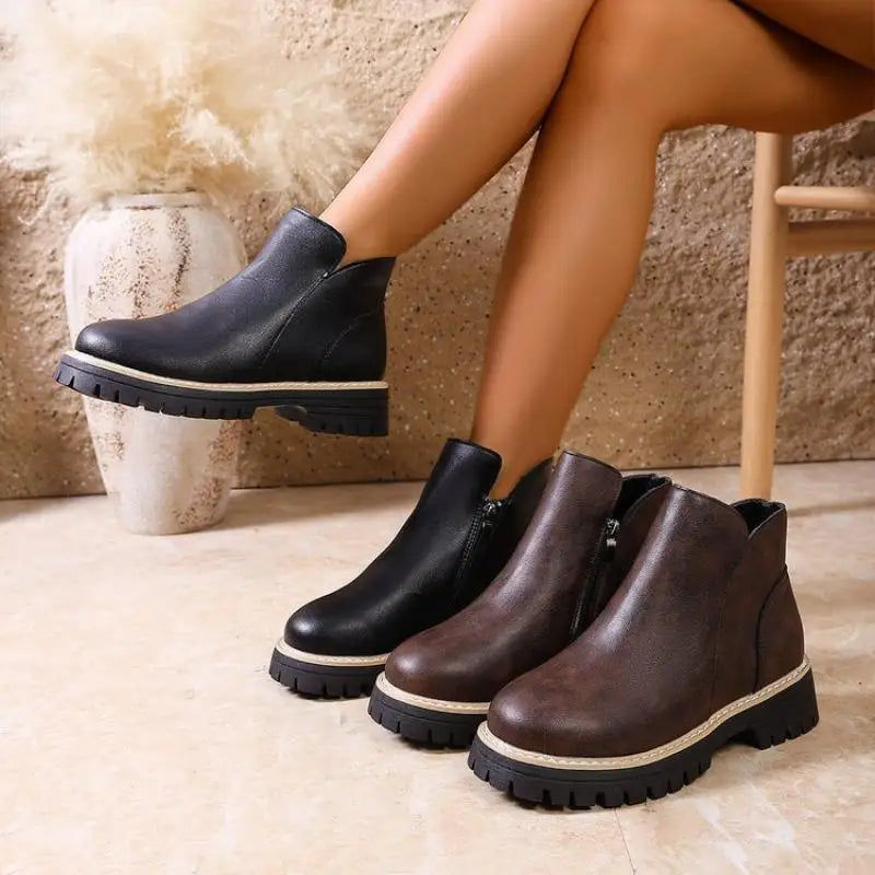 Detail view of the lug sole on women's premium leather ankle boots, highlighting grip and comfort.