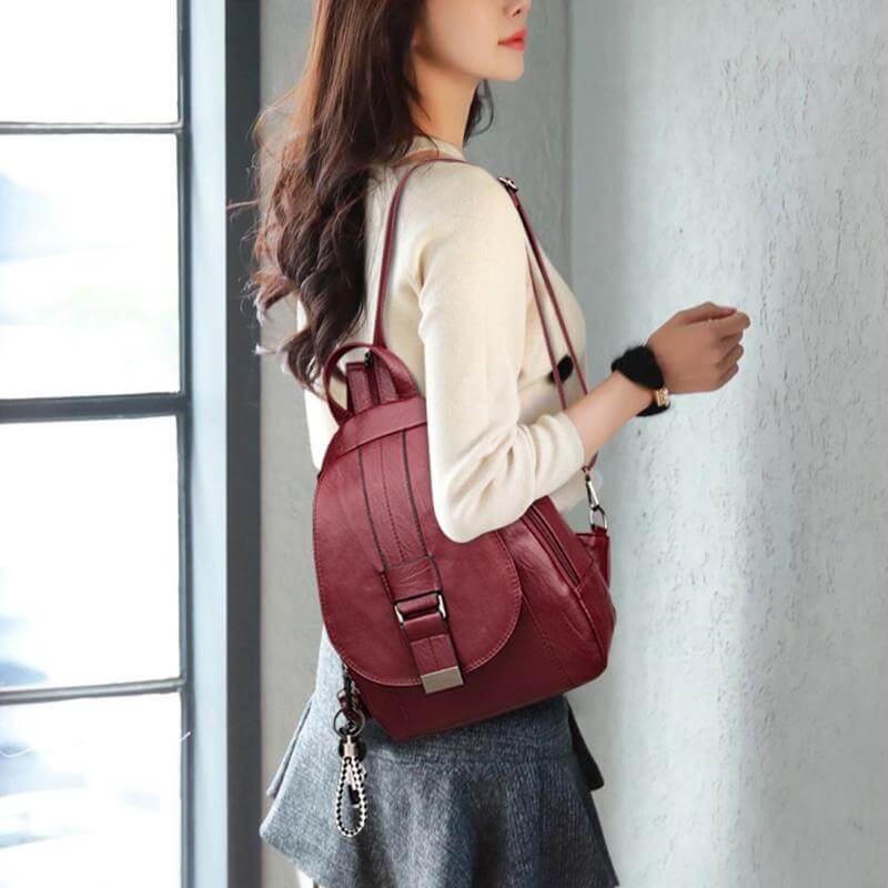 Premium women's water-resistant leather backpack, anti-theft features for peace of mind.