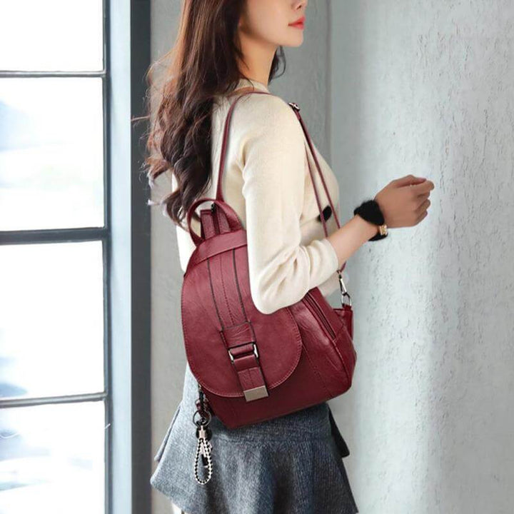 Premium women's water-resistant leather backpack, anti-theft features for peace of mind.