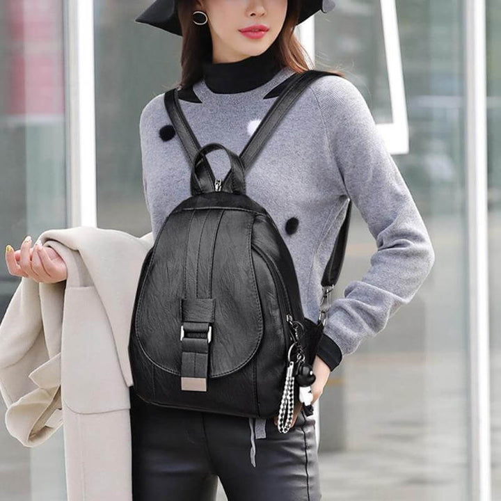 Fashion-forward women's leather backpack, water-resistant & comfortable for daily use.