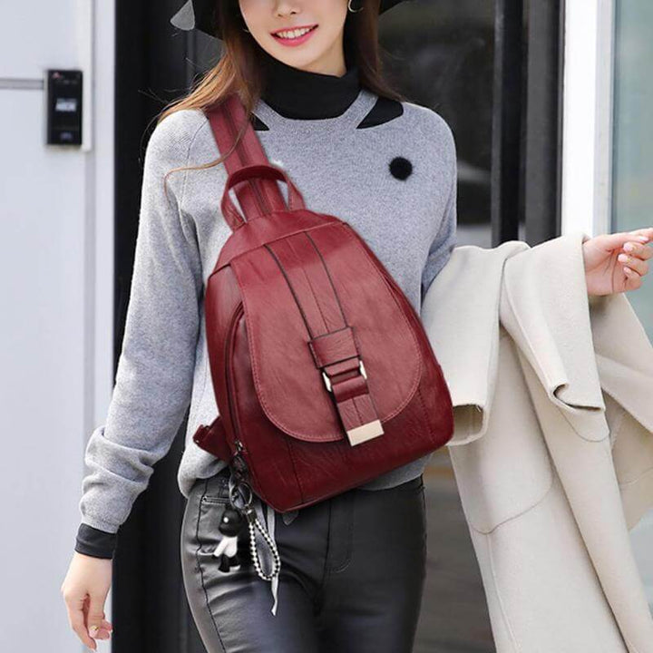 Practical women's water-resistant leather backpack, anti-theft, great for work or travel.