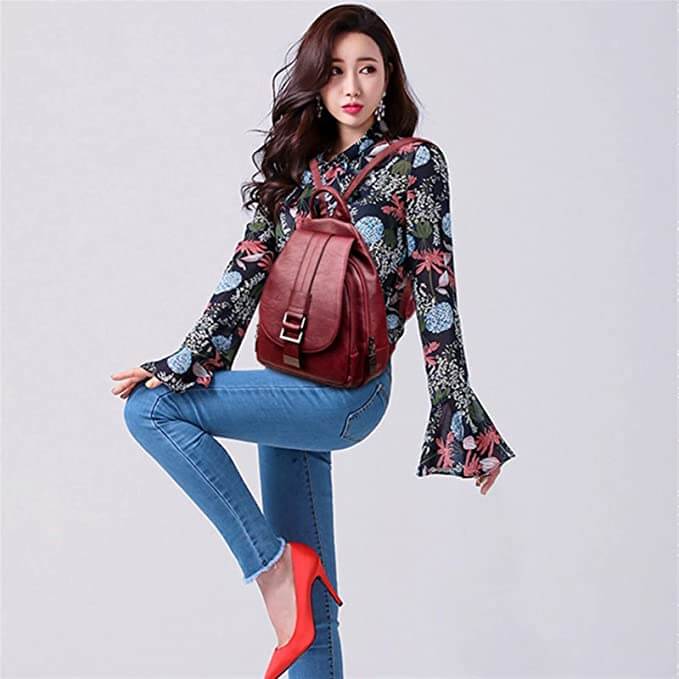 Secure women's premium leather backpack, water-resistant for daily errands & travel escapades.