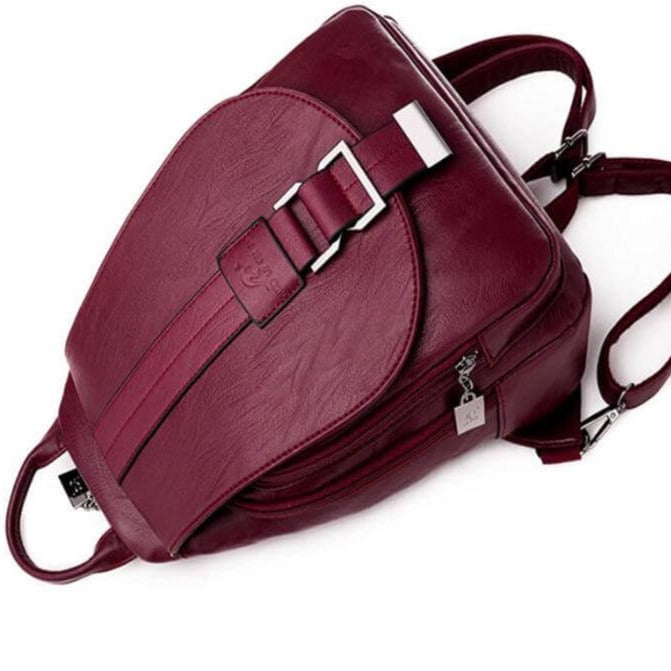 Elegant women's leather travel backpack, water-resistant for all weather. Premium gift for her.