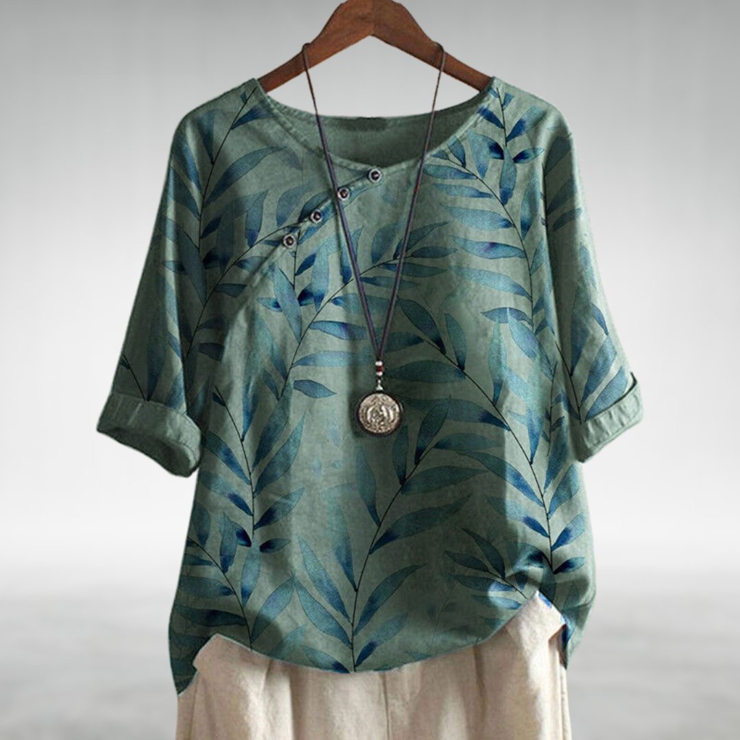 Women's printed asymmetric blouse, stylish & flowy for effortless everyday wear.
