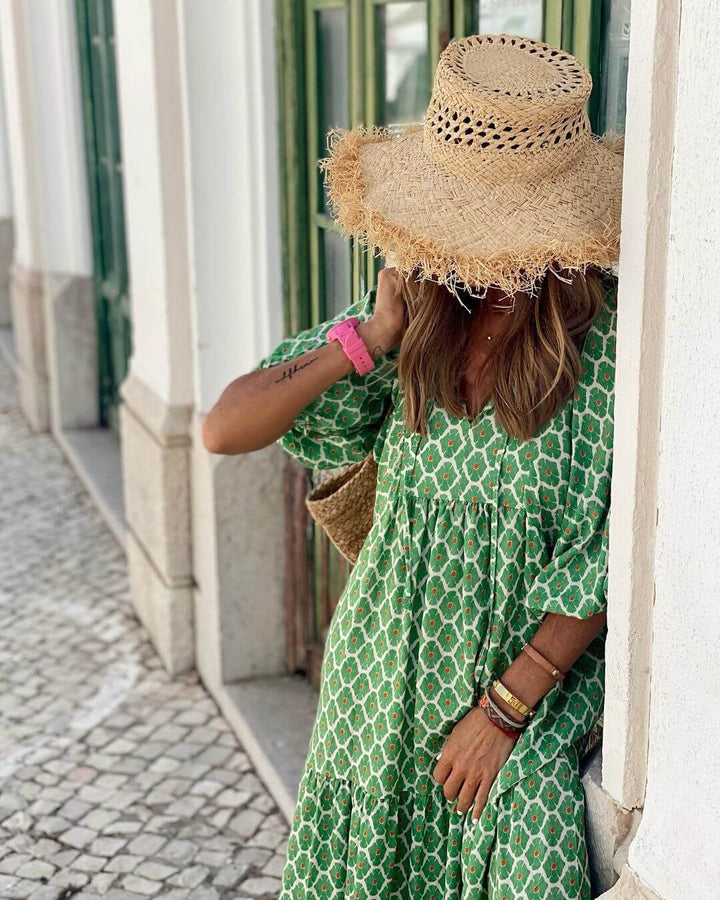 Fashionable women's printed dress, a maxi style with a flattering waistband for an elegant drape.