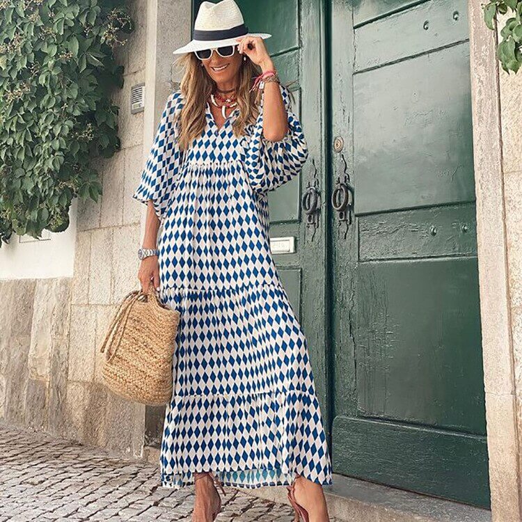 Women's printed maxi dress with a flattering waistband, a key piece for stylish seasonal looks.