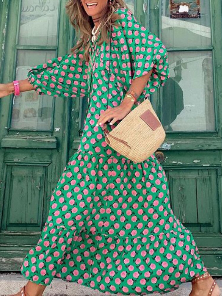 Versatile women's printed maxi dress with a flattering waistband, ideal for parties or casual wear.