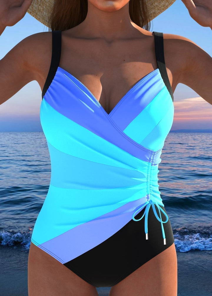 Elegant women's printed surplice swimsuit, perfect for vacation, beach, or poolside with tummy control.