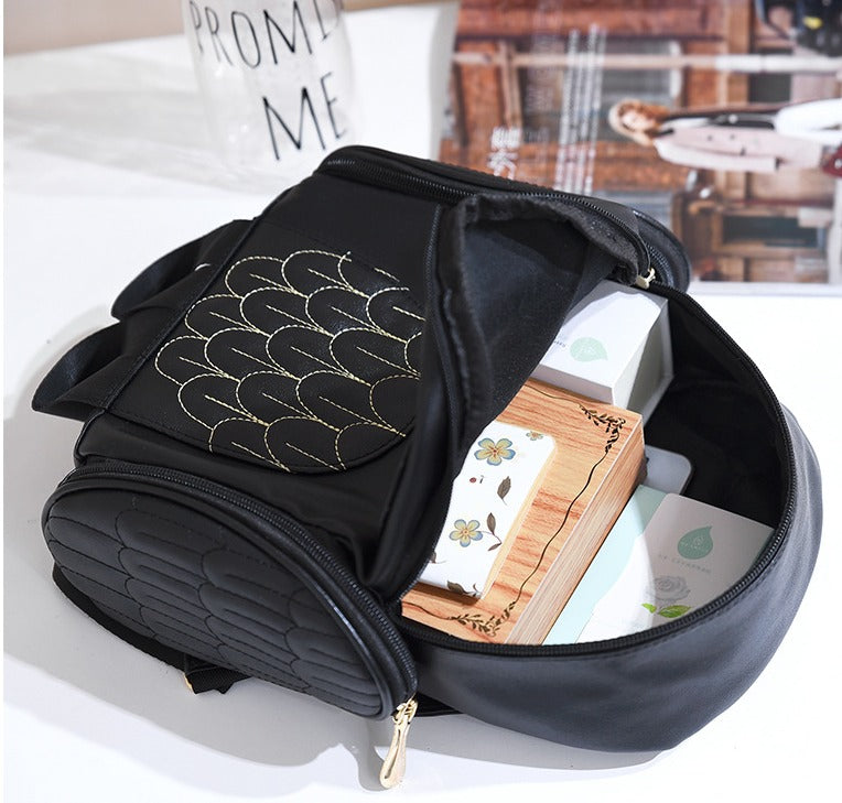 Multi-pocket PU leather backpack for women, trendy owl print. Great gift for her, stylish accessory.